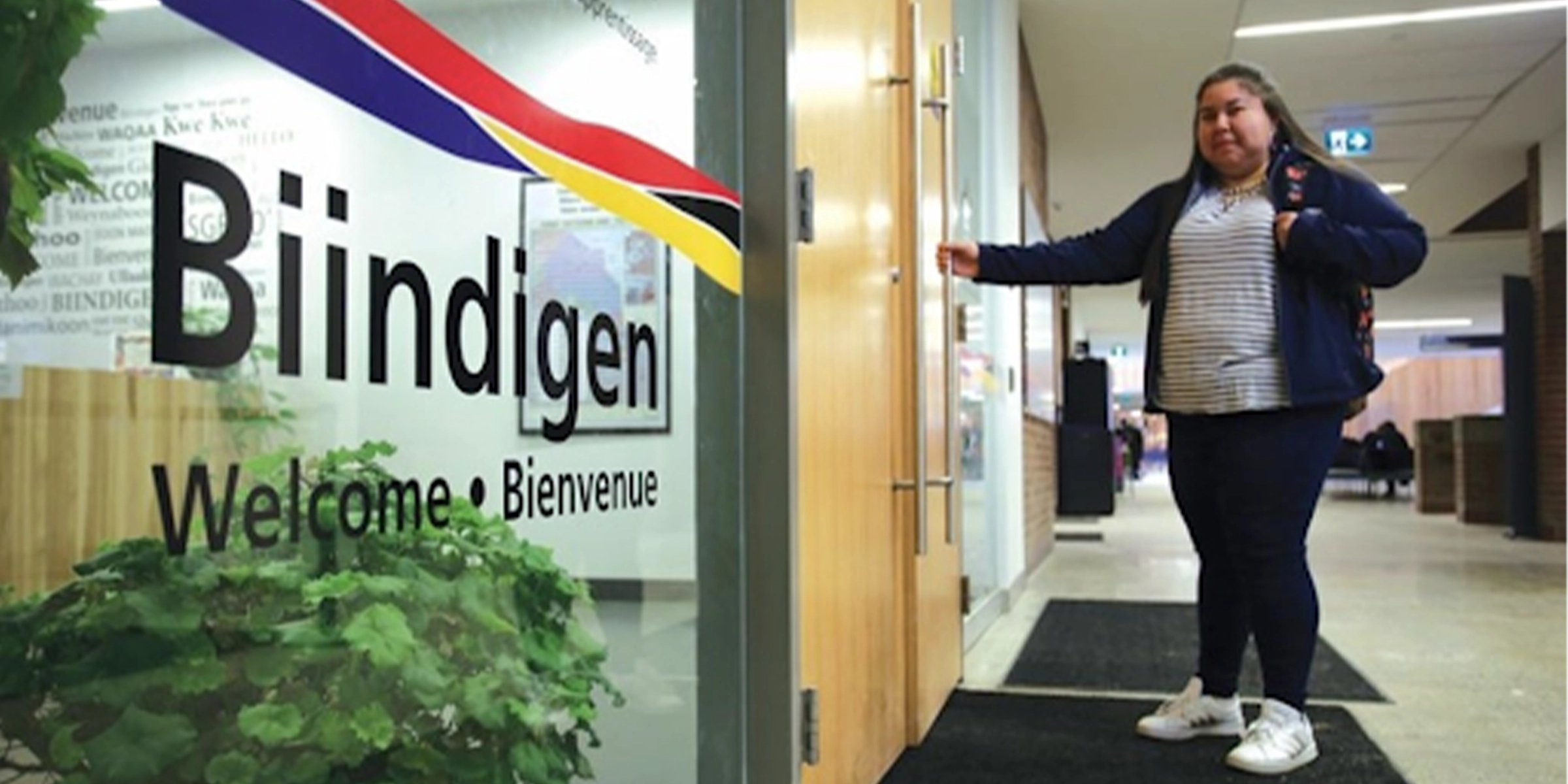 Student entering the Indigenous Sharing and Learning Centre
