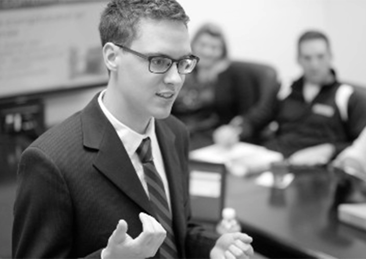 a business student presents in a class