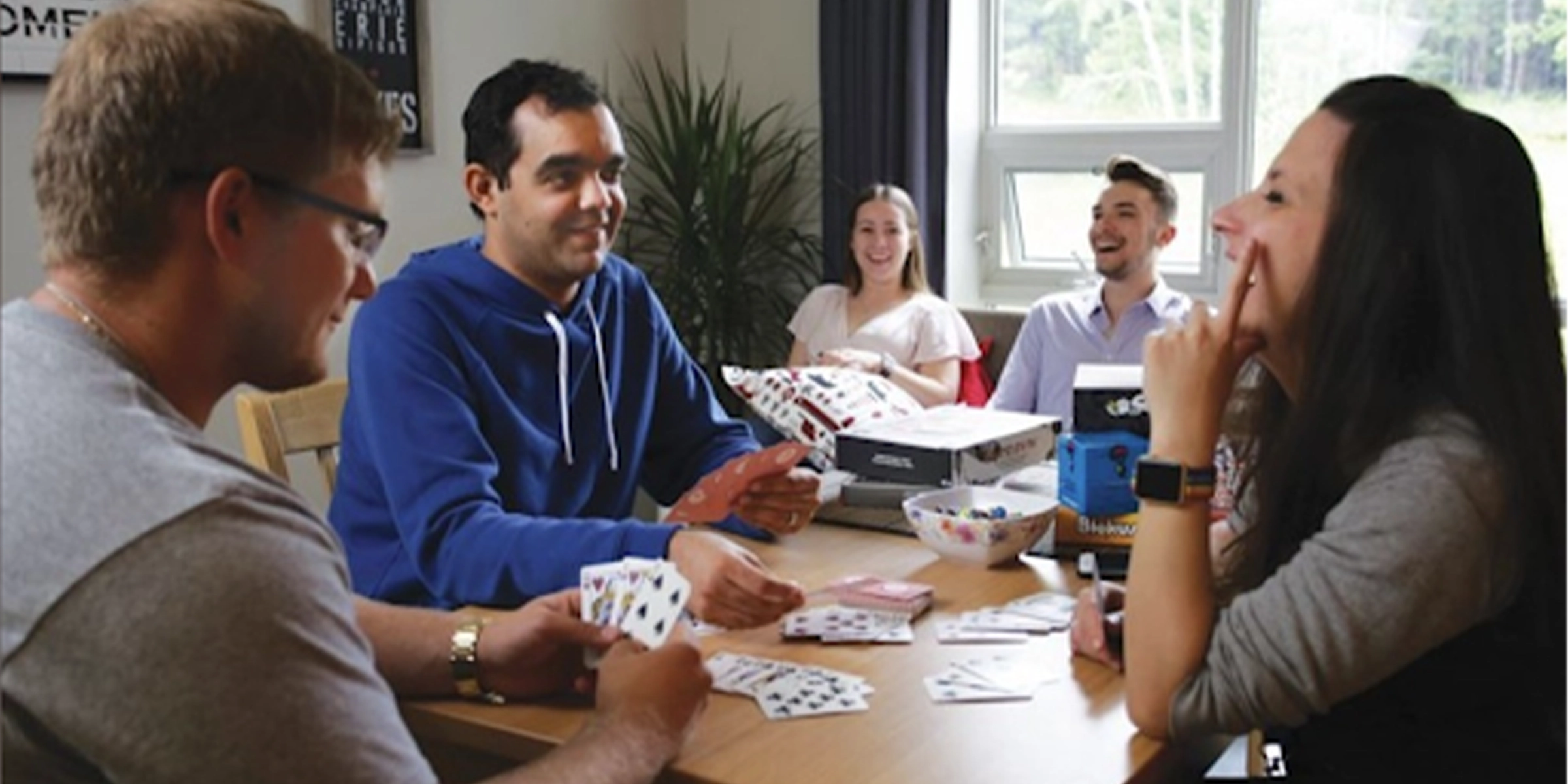 Students playing a card game